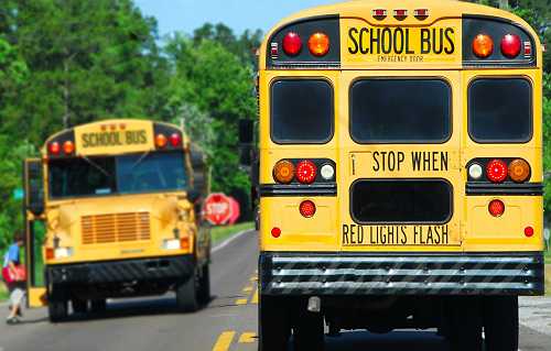 Mom arrested after helping daughter beat up a teen waiting at bus stop - theGrio