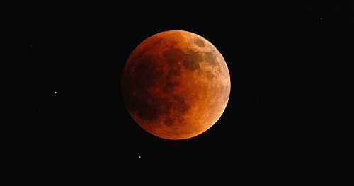 Why will the moon be shades of red, orange and yellow tonight? Here's what causes a 